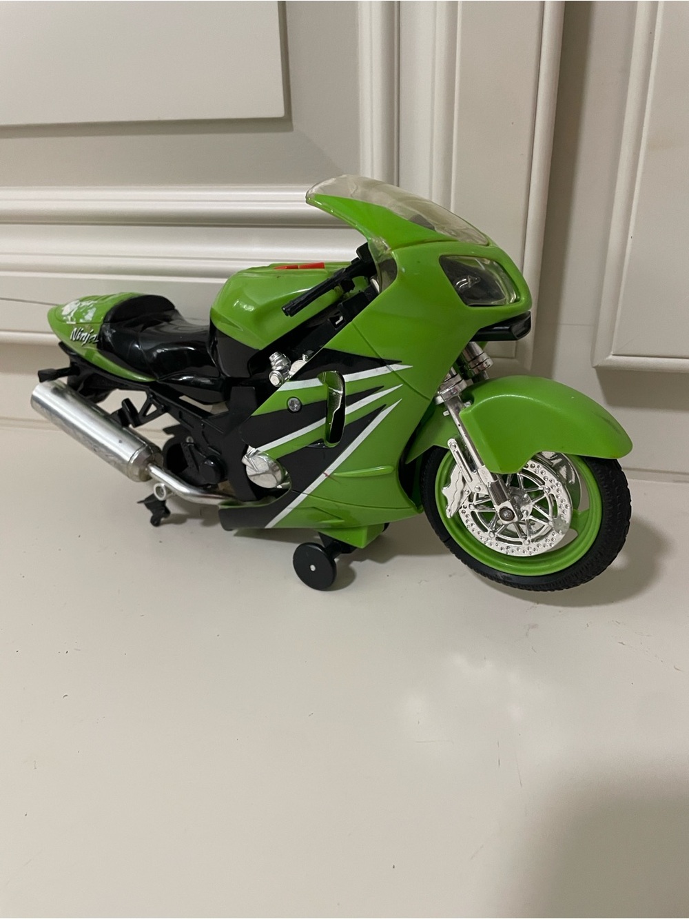 Green Kids Motorcycle Toy - Die-Cast Sport Bike one wheel is missing